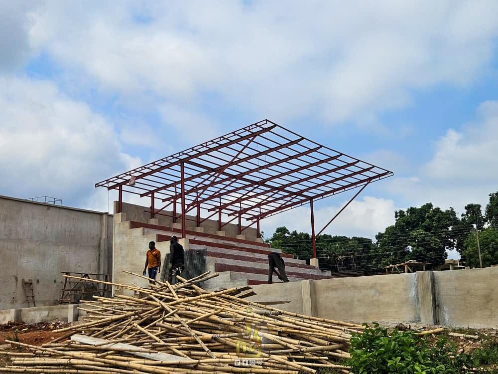 Steel roof structure over concrete terracing