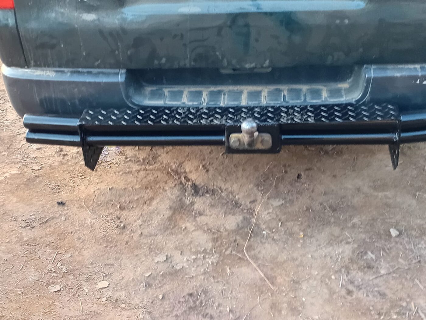 Fabricated steel rear bumper with tow bar